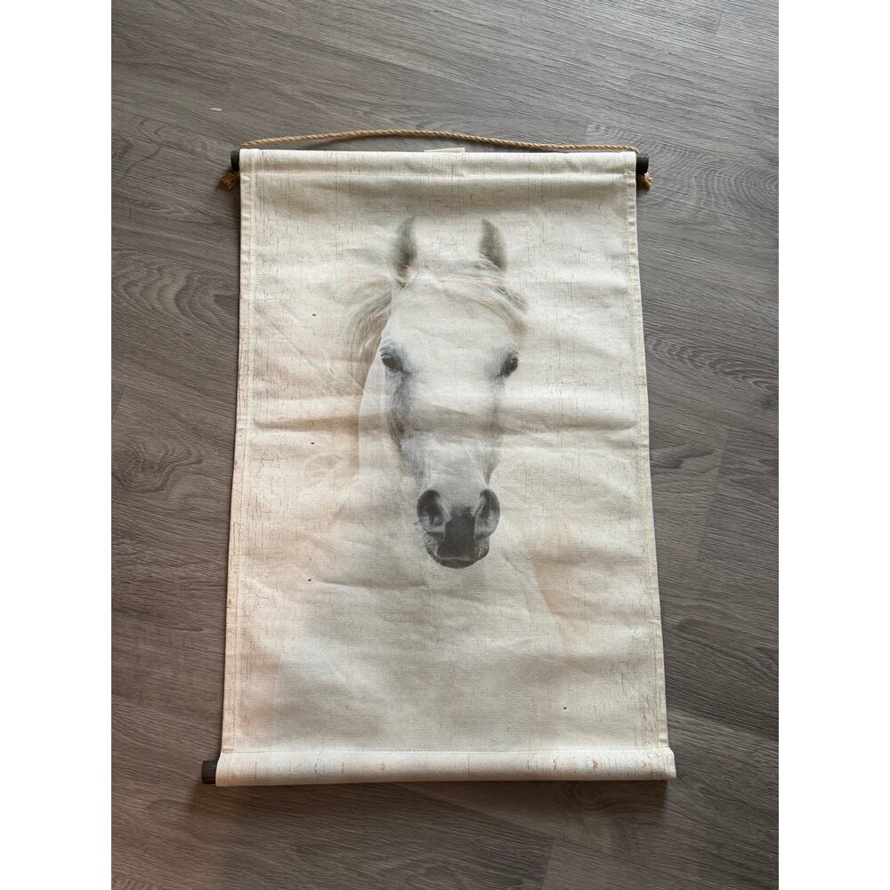 Canvas wall hanging with white horse